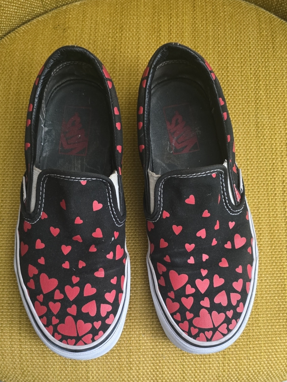 Vans Black Canvas Slip-On Flats with Red Heart Print